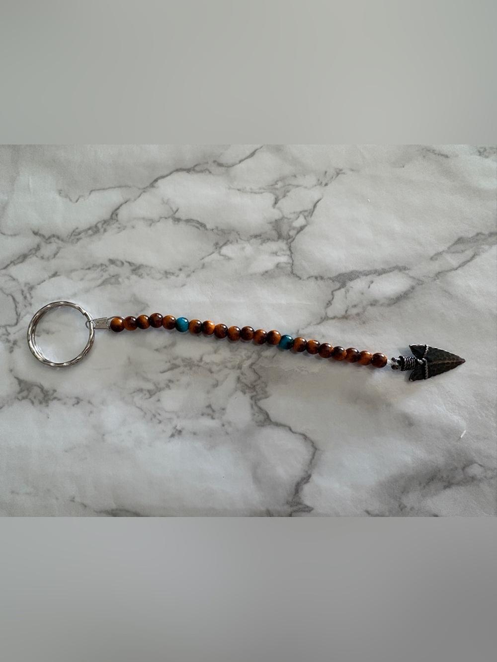 Beaded Arrowhead Keychain with Turquoise Accents - Brown